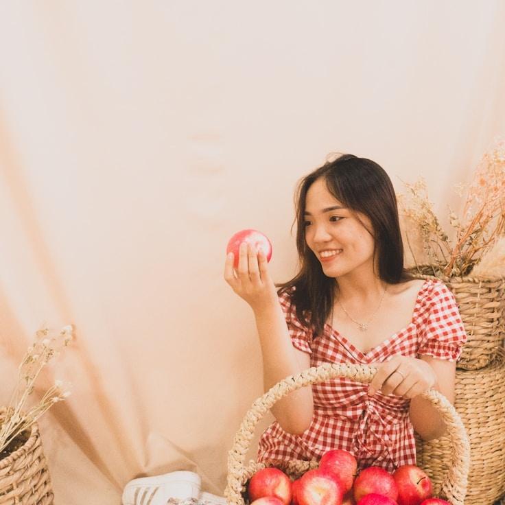 Alex Chen, Lead Design Curator at WaterCoastlinePoint, reviewing corporate floral arrangements